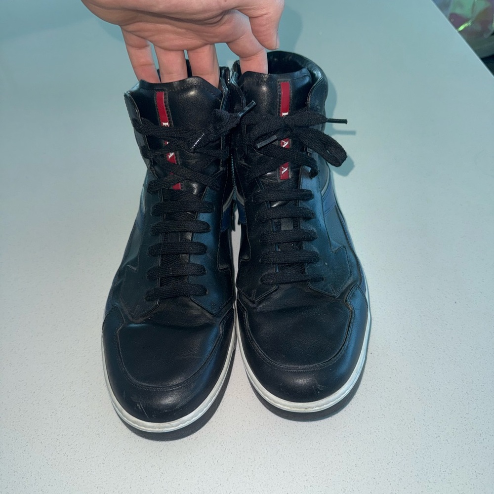 Prada Black and Red Sneakers with Classic Silhouette